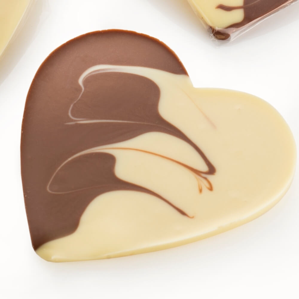 Each heart features a swirl design joining the two chocolate flavours together.